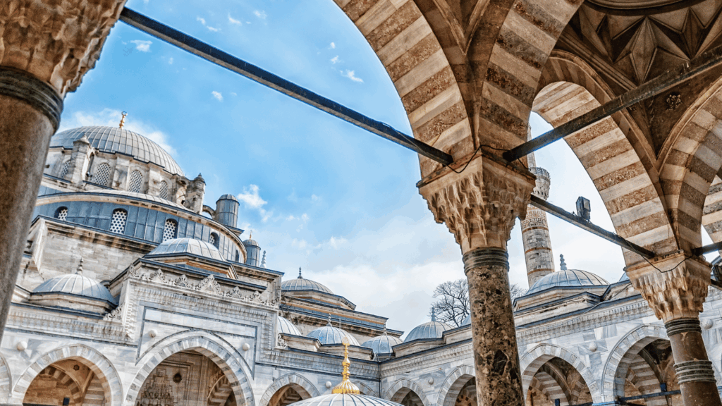 New Central Hotel - Beyazıt Mosque courtyard with arcades, where visitors pause before entering the prayer hall